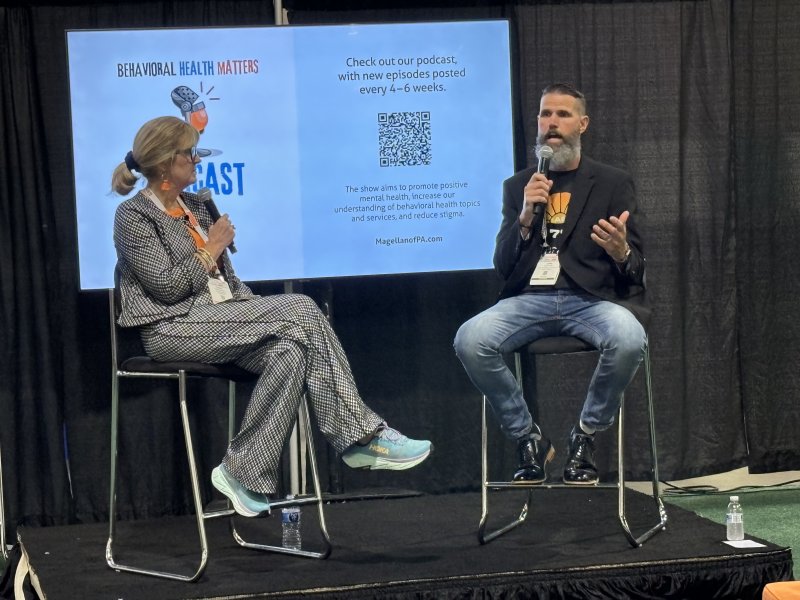 John Lees talking at the National Convention about the podcast.