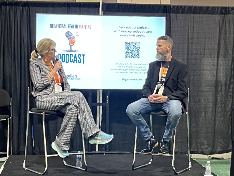 John Lees talking at the National Convention about the podcast.